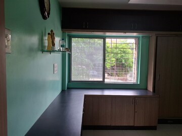 Bedroom in 2 BHK Apartment at Tanay Punyanagari, Wadgaon Sheri – for Rent