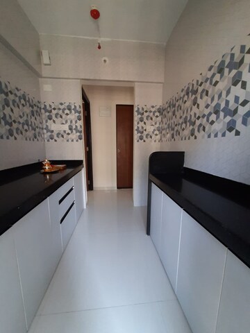 Kitchen in 1 BHK Apartment at Raunak Bliss, Ghodbunder Road – for Rent