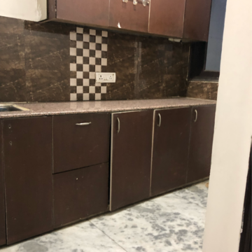 Kitchen in 1 BHK Apartment at Palm Residency Chhatarpur, Rajpur Khurd Extension – for Rent
