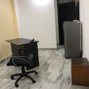 Living Room in 1 BHK Apartment at Palm Residency Chhatarpur, Rajpur Khurd Extension – for Rent