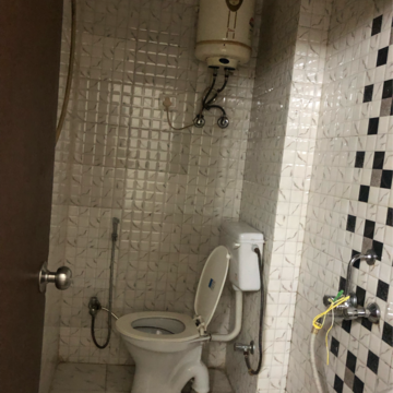 Bathroom in 1 BHK Apartment at Palm Residency Chhatarpur, Rajpur Khurd Extension – for Rent