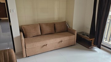 Living Room in 1 BHK Apartment at Raunak Bliss, Ghodbunder Road – for Rent