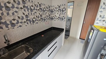 Kitchen in 1 BHK Apartment at Raunak Bliss, Ghodbunder Road – for Rent