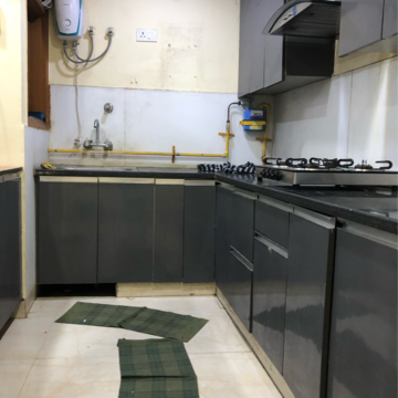 Kitchen in 2 BHK Apartment at Palm Residency Chhatarpur, Rajpur Khurd Extension – for Rent