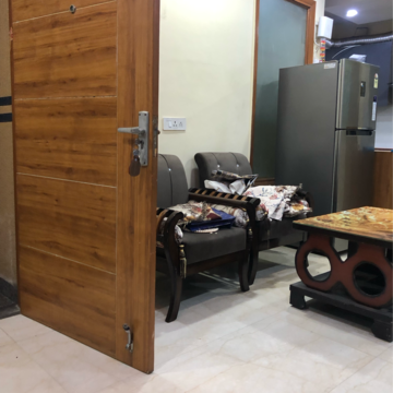 Living Room in 2 BHK Apartment at Palm Residency Chhatarpur, Rajpur Khurd Extension – for Rent