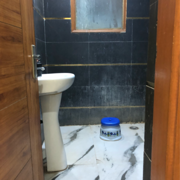 Bathroom in 2 BHK Apartment at Palm Residency Chhatarpur, Rajpur Khurd Extension – for Rent