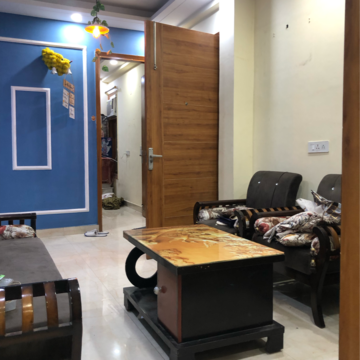 Living Room in 2 BHK Apartment at Palm Residency Chhatarpur, Rajpur Khurd Extension – for Rent