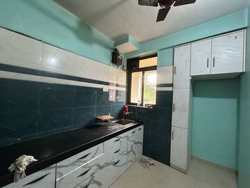 Kitchen in 1 BHK Apartment at Sai Baba Vihar Complex, Ghodbunder Road – for Rent