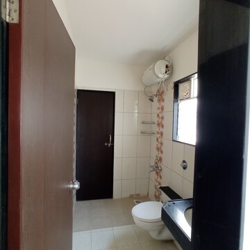 Bathroom in 1 BHK Apartment at Paranjape Schemes The Highlands, Bhugaon – for Rent