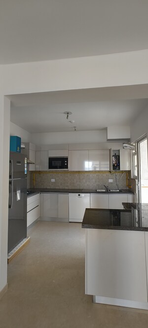 Kitchen in 4 BHK Apartment at Godrej Woods, Sector 43 – for Sale
