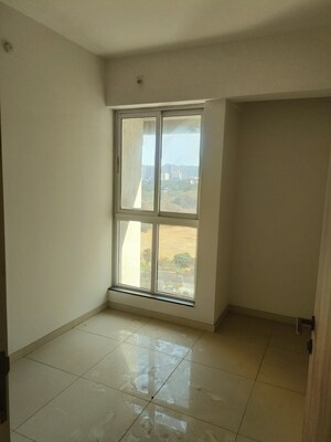 Room in 1.5 BHK Apartment at Godrej Emerald, Ghodbunder Road – for Sale