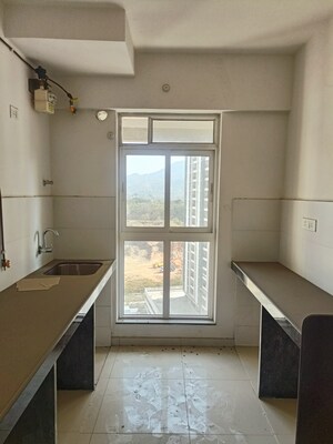 Kitchen in 1.5 BHK Apartment at Godrej Emerald, Ghodbunder Road – for Sale