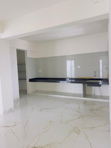 Kitchen in 4 BHK Apartment at Shafalya Aurum Legacy, Sola – for Rent