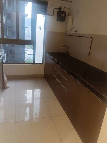 Kitchen in 2 BHK Apartment at Agarwal Residency CHS, Nalasopara East – for Rent