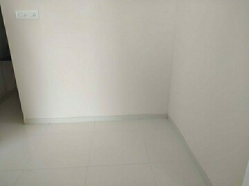 Room in 2 BHK Apartment at Shree Hans Nagar CHS, Dhanori – for Sale