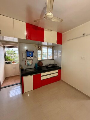 Kitchen in 2 BHK Apartment at Shree Hans Nagar CHS, Dhanori – for Sale