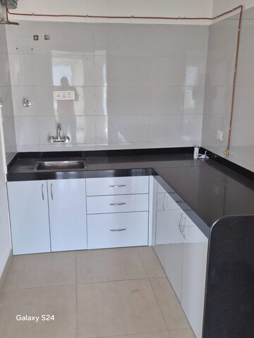 Kitchen in 1 BHK Apartment at Paranjape Forest Trails High Gardens, Bhugaon – for Rent