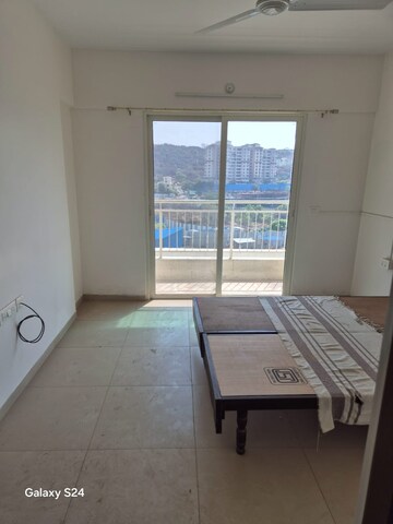 Bedroom in 1 BHK Apartment at Paranjape Forest Trails High Gardens, Bhugaon – for Rent