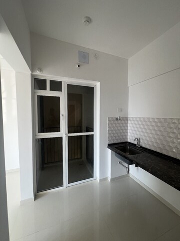 Kitchen in 2 BHK Apartment at Godrej Boulevard, Manjari – for Rent