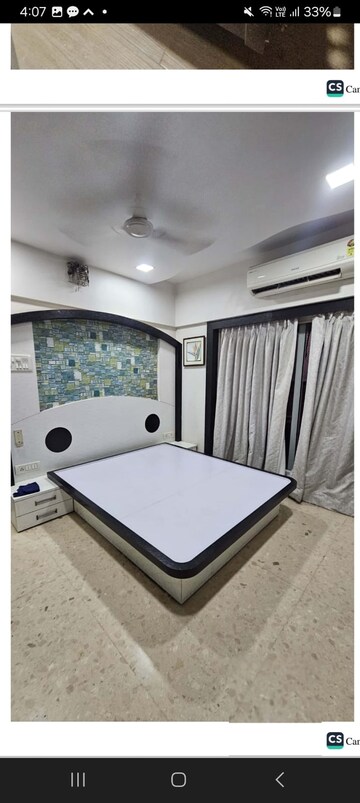 Bedroom in 2 BHK Apartment at Archstone Infinity Tower, Kopar Khairane – for Rent
