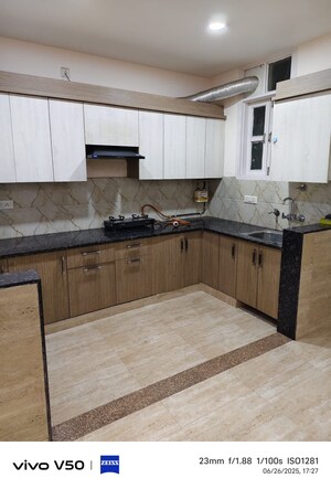 Kitchen in 3 BHK Builder Floor at Shakti Khand iv – for Sale