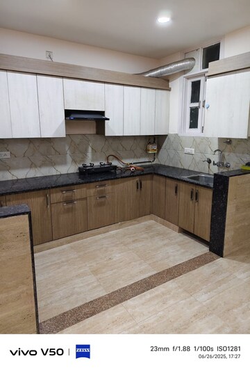Kitchen in 3 BHK Builder Floor at Shakti Khand iv – for Sale