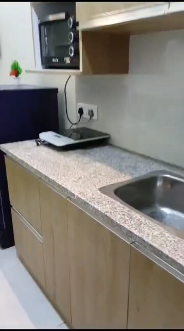 Kitchen in Studio Apartment at Gaur City Center, Sector 4 Greater Noida – for Rent