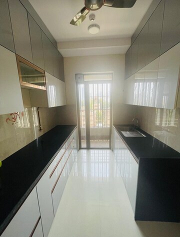 Kitchen in 2 BHK Apartment at Kalpataru Paramount, Kapur Bawdi – for Rent