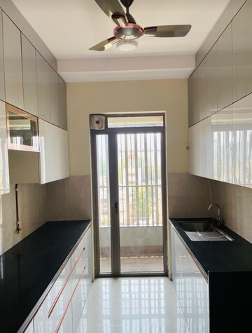 Kitchen in 2 BHK Apartment at Kalpataru Paramount, Kapur Bawdi – for Rent