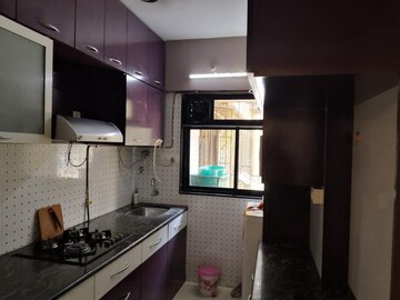 Kitchen in 1 BHK Apartment at Mantri Park, Goregaon East – for Rent