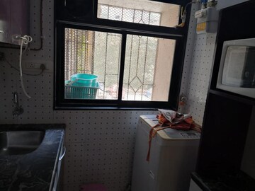 Kitchen in 1 BHK Apartment at Mantri Park, Goregaon East – for Rent