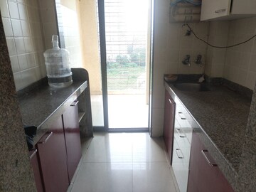 Kitchen in 1 BHK Apartment at Coral Heights, Kavesar – for Rent