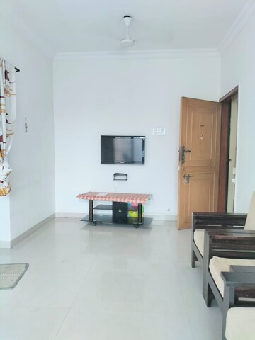 Living Room in 1 BHK Apartment at K Raheja Heights, Malad East – for Rent