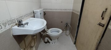 Bathroom in 3 BHK Apartment at Harsh CHS Tilak Nagar, Tilak Nagar – for Rent