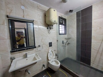 Bathroom in 4 BHK Builder Floor at Model Town Phase 2 – for Rent