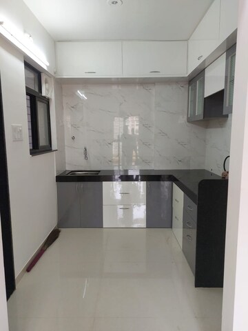 Kitchen in 2 BHK Apartment at Kiran Sufal, Wakad – for Rent