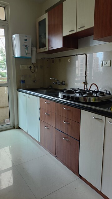Kitchen in 1 BHK Apartment at Hiranandani Estate Silverlink, Ghodbunder Road – for Rent