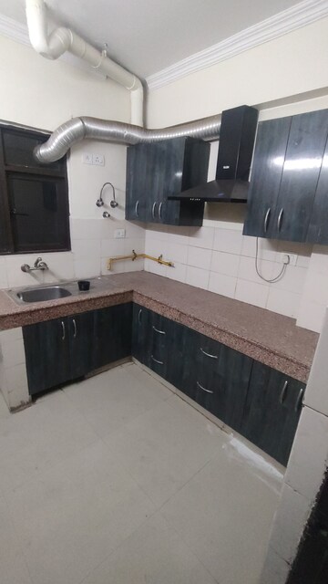 Kitchen in 2 BHK Apartment at Logix Blossom County, Sector 137 – for Rent