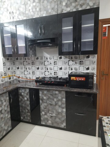 Kitchen in 4 BHK Apartment at Rishita Celebrity Greens, Sushant Golf City – for Rent