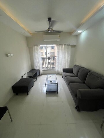 Living Room in 2 BHK Apartment at Bini Winspace Amelio, Andheri West – for Sale