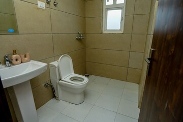 Bathroom in 3 BHK Apartment at Indosam75, Sector 75 – for Rent