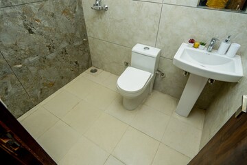 Bathroom in 3 BHK Apartment at JM Aroma, Sector 75 – for Rent