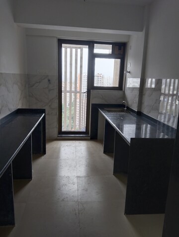 Kitchen in 2 BHK Apartment at Naman Habitat, Andheri West – for Sale