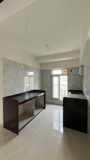 Kitchen in 2 BHK Apartment at Zee Ashtavinayak, Andheri West – for Sale