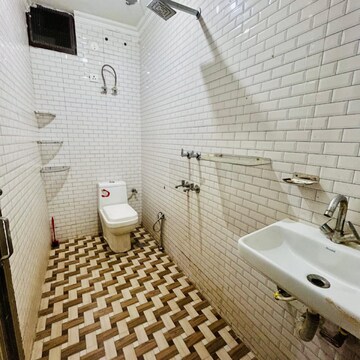 Bathroom in 1 BHK Builder Floor at Risland Sky Mansion, Chattarpur – for Rent