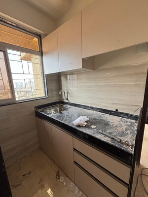 Kitchen in 1 BHK Apartment at Lashkaria Pearl, Jogeshwari West – for Sale