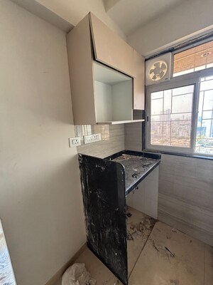 Kitchen in 1 BHK Apartment at Lashkaria Pearl, Jogeshwari West – for Sale