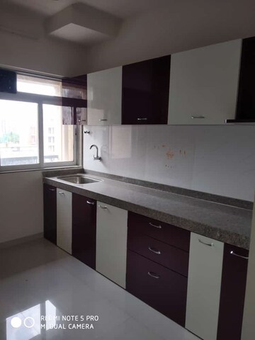 Kitchen in 2 BHK Apartment at Squarefeet Ace Square, Ghodbunder Road – for Rent