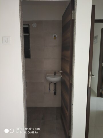 Bathroom in 2 BHK Apartment at Squarefeet Ace Square, Ghodbunder Road – for Rent
