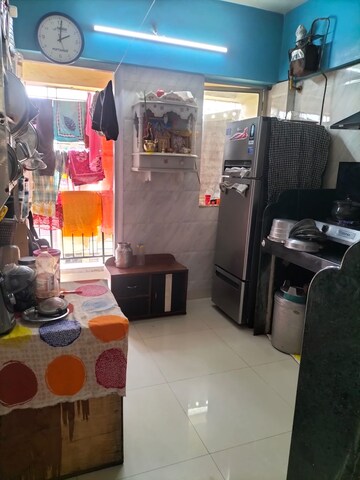 Kitchen in 2 BHK Apartment at Himgiri Lokupvan Phase II CHS Ltd, Vasant Vihar – for Sale